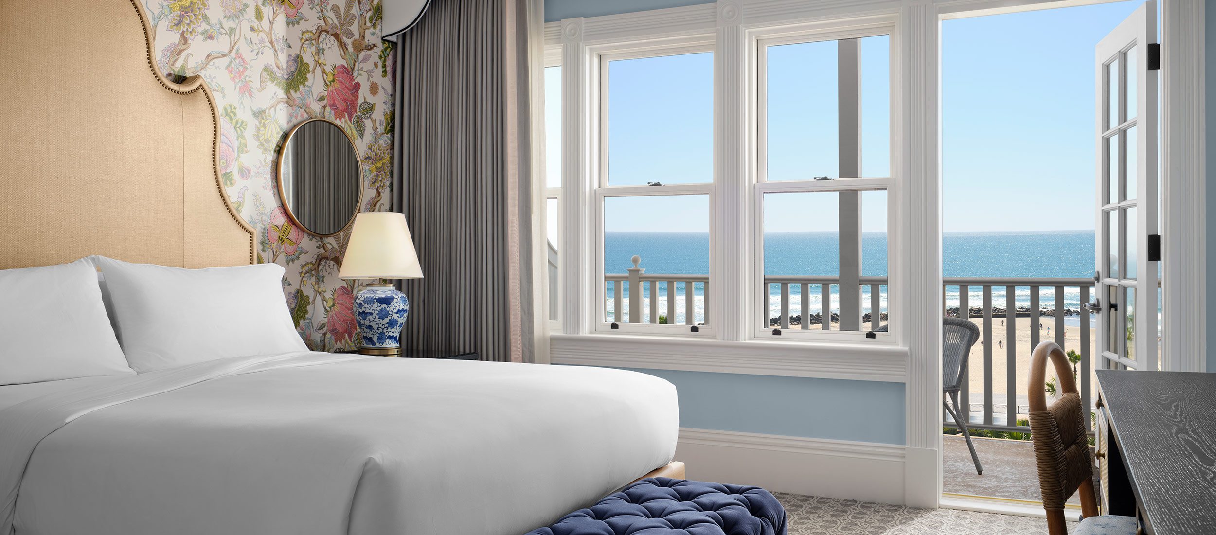 Oceanfront Victorian guest room with king bed and balcony