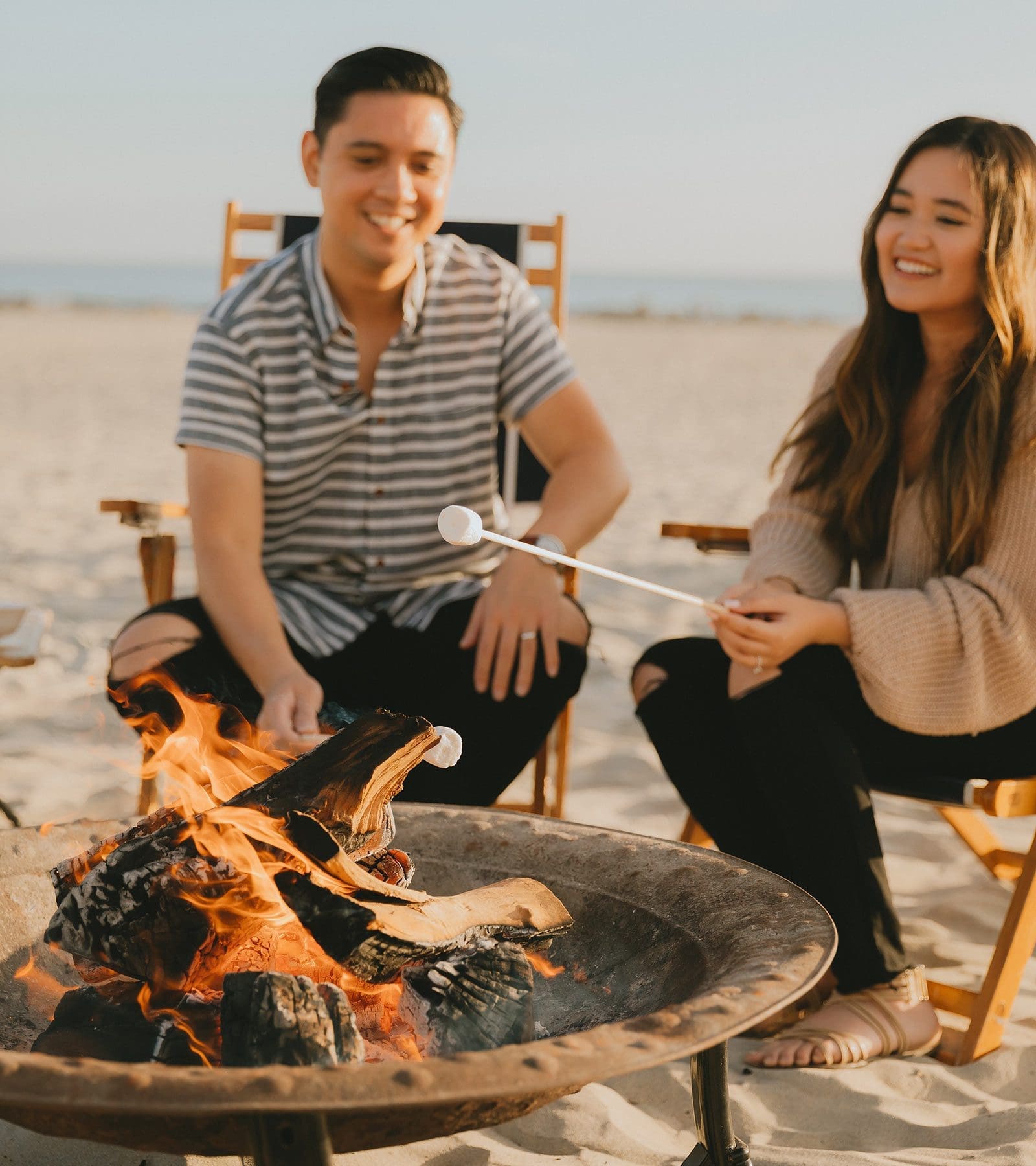 Couple roasting marshmallows